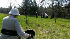 Major Howson "supervising" tree planting at Glen Burn