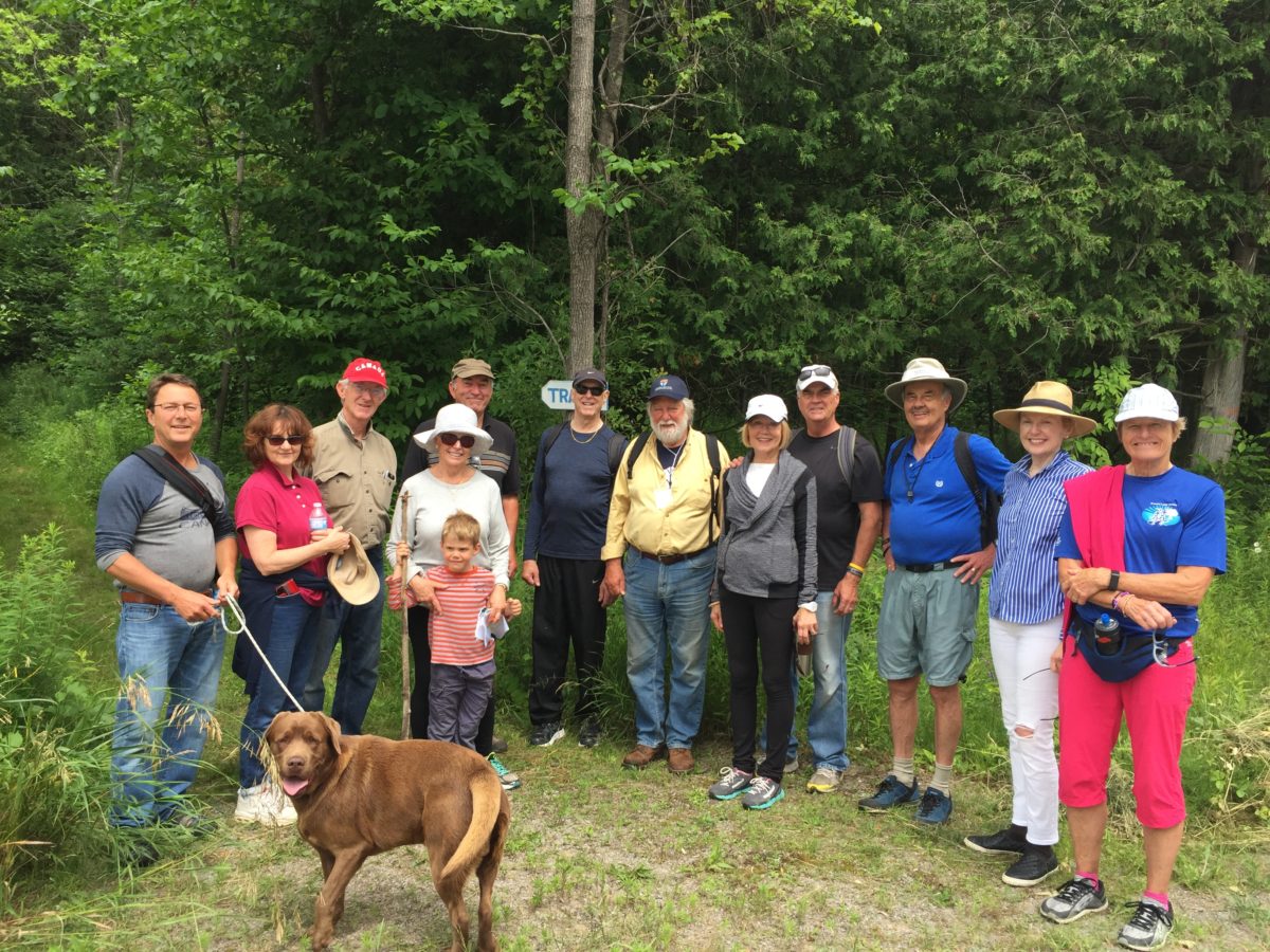 Jeremy Carver (centered in yellow) with a group of hikers at the Stony Lake Trails Celebration