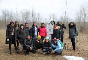 Group photo of hikers at Kawartha Land Trust, Diverse Nature Collective, and Let's Hike T.O. partnered hike at KLT's Stony Lake Trails