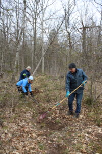 Three KLT volunteers helping blaze a trail at ORCA's Heber Rogers Wildlife Area