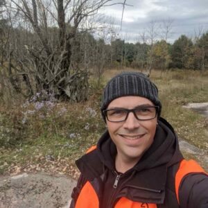 Jeff Park standing in nature on a cold day.