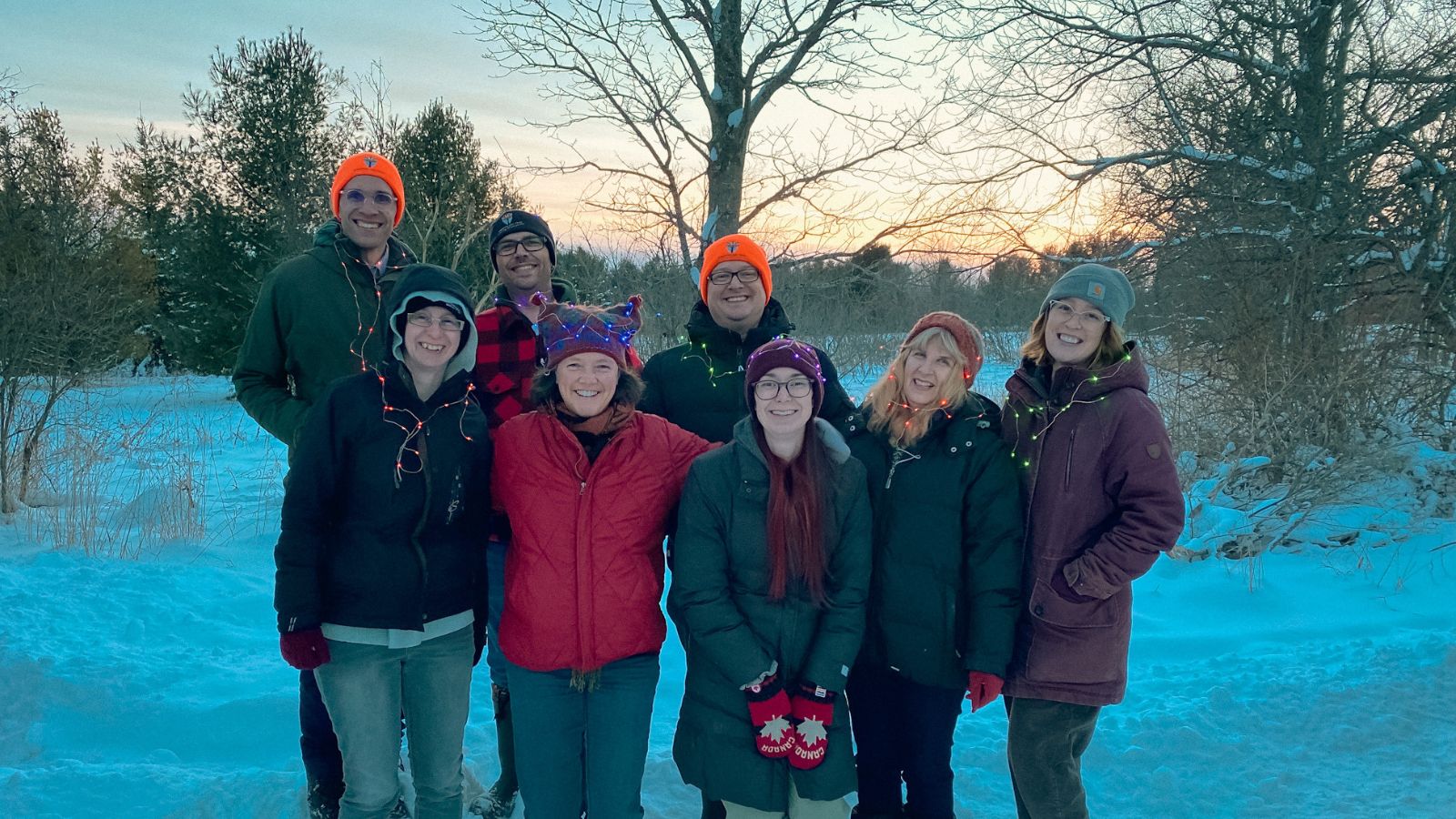 Happy Holidays from Kawartha Land Trust staff. Staff group shot outside on winter solstice.