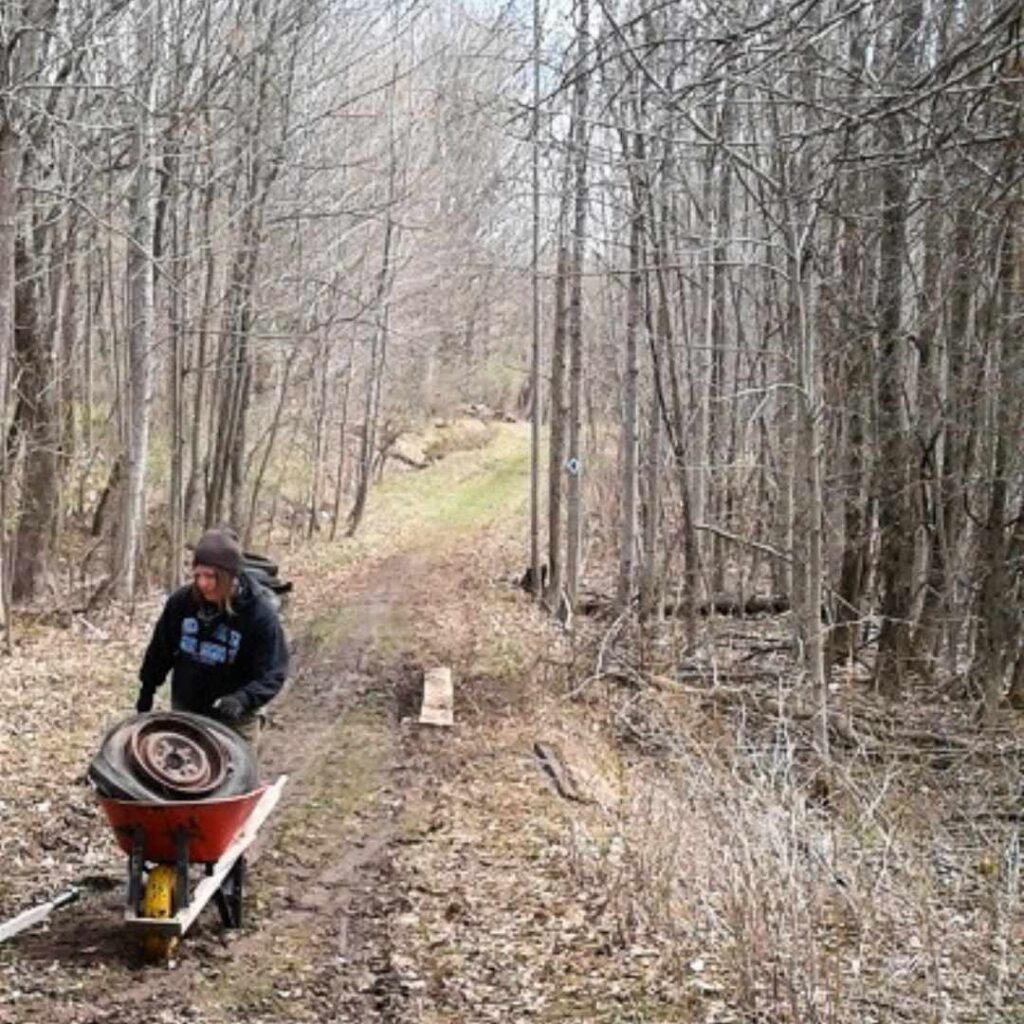 Wheelbarrow to remove legacy waste from Ingleton-Wells