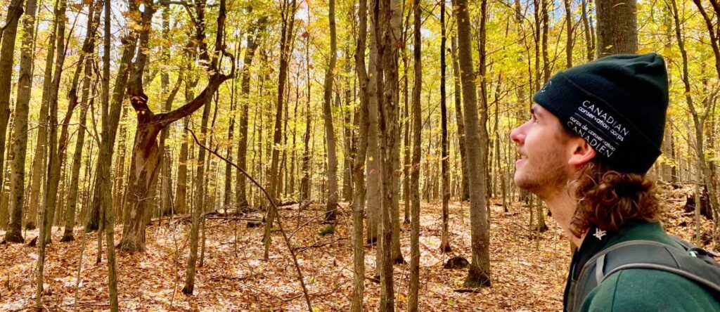 Canadian Conservation Corps Intern Tanner Stevens at Kawartha Land Trust's BIg (Boyd Chiminis) Island in Pigeon Lake