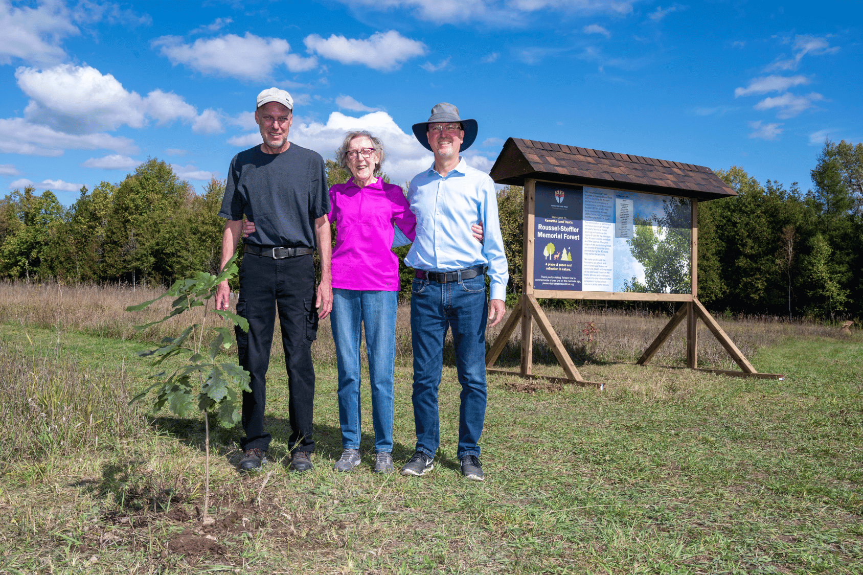 Dan Roussel, Marlene Roussel, Mike Roussel, at opening of Roussel-Steffler Memorial Forest in Douro-Dummer Township