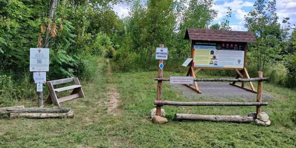 The entrance of the community trails at KLT's Ingleton-Wells Property.